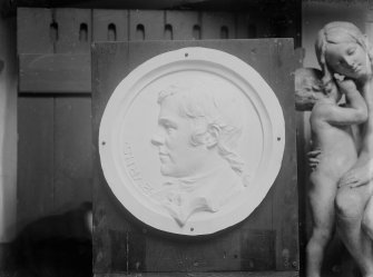 Roundel of Robert Burns medallion in situ in the artist's studio.