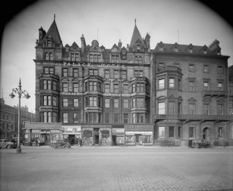 View from south of 112 - 117 Princes Street showing the Palace Hotel, and cars.