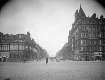 View from south looking down Castle Street showing part of the Palace Hotel and 118 Princes Street showing a policeman directing the traffic.