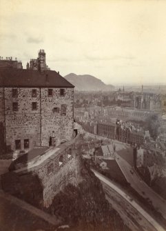 Historic photograph.
View of part of the Naval and Military Museum and outer wall taken from the New Barracks with views to the Grassmarket and Arthur Seat.
Mount signed: 'Thomas Ross' and inscribed: 'Edinburgh Castle. December 1912'.
