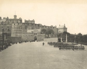 Historic photographic view of drill on esplanade looking towards the castle.
