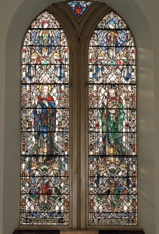 Interior.
View of stained glass window on S wall.
