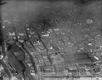 Glasgow, general view, showing Central and Queen Street Stations.  Oblique aerial photograph taken facing north-east.  