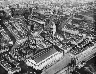 Dundee, general view, showing High Street and City Square.  Oblique aerial photograph taken facing north. 