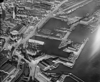 Dundee, general view, showing Earl Grey Dock, King William IV Dock and Tidal Harbour.  Oblique aerial photograph taken facing north. 