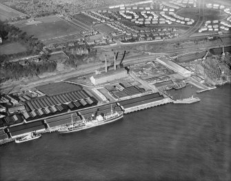 Dundee, general view, showing Camperdown Dock and Queen Elizabeth Wharf.  Oblique aerial photograph taken facing north-east. 