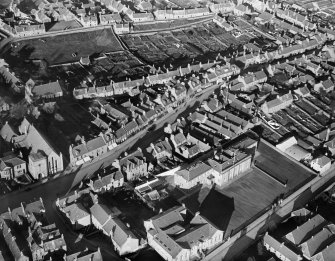 Forfar, general view, showing East High Street and Chapelpark Primary School.  Oblique aerial photograph taken facing north.