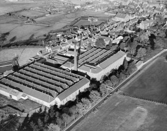 Craiks Ltd. Linen and Jute Manor Works, Manor Street, Forfar.  Oblique aerial photograph taken facing north.