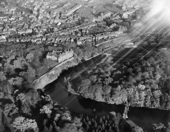 Brechin, general view, showing Brechin Castle.  Oblique aerial photograph taken facing east. 