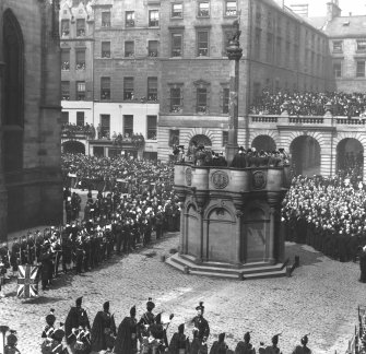 General view of Market Cross during ceremony, possibly the death of Edward VII.