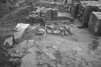 Jedburgh Abbey excavation archive
Frame 12: Trench J: wall 1049, from N