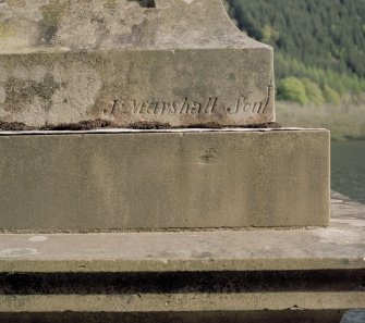 Detail of sculptors name (J. Marshall)