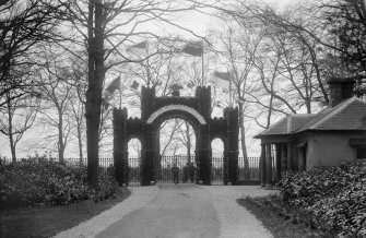 View of main gateway to Blythswood House decorated for the visit of the Prince and Princess of Wales 11 October 1876.