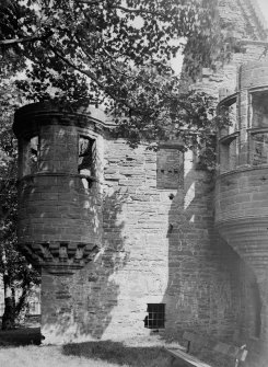 Detail of angle turret and oriel.