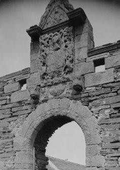 View of gateway with heraldic panel.