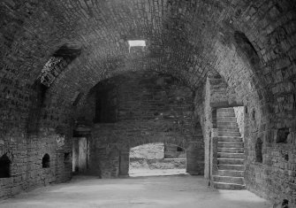Interior. View of kitchen and storehouse.