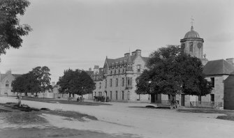 View of The Square showing the Grant Arms Hotel and part of Speyside House.