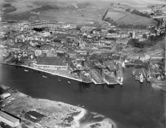 Dumbarton, general view, showing shipyard and Riverside Parish Church.  Oblique aerial photograph taken facing north.