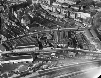Cupar, general view, showing Edenside Printing Works and Station Road.  Oblique aerial photograph taken facing north.