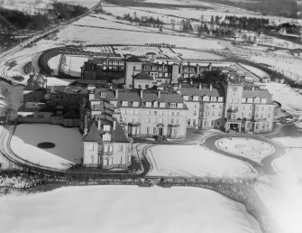 Oblique aerial photograph taken facing east showing Gleneagles Hotel in 1928.