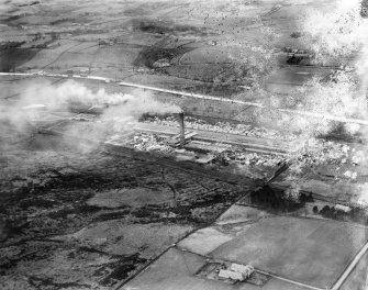 John G Stein and Co. Ltd., Castlecary Brickworks.  Oblique aerial photograph taken facing north-west.  This image has been produced from a damaged negative.