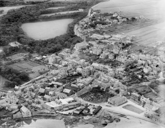 Banff, general view, showing St Mary's Church and Burial Ground and Duff House Gardens.  Oblique aerial photograph taken facing south-west.