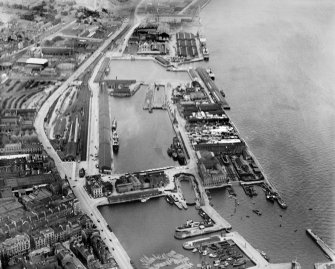 Dundee, general view, showing Camperdown and Victoria Docks and Queen Elizabeth Wharf.  Oblique aerial photograph taken facing east.