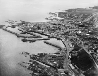 Macduff, general view, showing Macduff Harbour and Princess Royal Basin.  Oblique aerial photograph taken facing east.