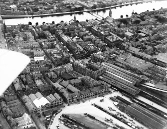 Inverness, general view, showing Inverness Station and Academy Street.  Oblique aerial photograph taken facing west.  