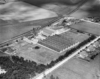 William Teacher and Sons Ltd. Ardmore Distillery, Kennethmont, Huntly.  Oblique aerial photograph taken facing north.