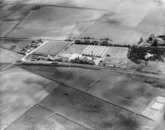 William Teacher and Sons Ltd. Ardmore Distillery, Kennethmont, Huntly.  Oblique aerial photograph taken facing south.