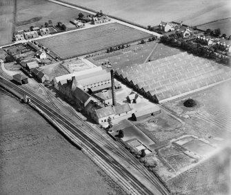 William Teacher and Sons Ltd. Ardmore Distillery, Kennethmont, Huntly.  Oblique aerial photograph taken facing south-east.