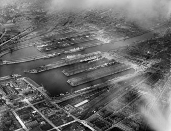 Queen's Dock and Prince's Dock, Glasgow.  Oblique aerial photograph taken facing north-east.