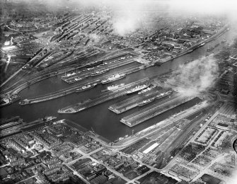 Queen's Dock and Prince's Dock, Glasgow.  Oblique aerial photograph taken facing north-east.