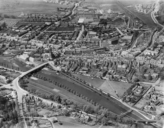 Peebles, general view, showing Tweed Bridge, Eddlestone Water and Ballantyne Brothers and Co. Ltd. March Street Mills.  Oblique aerial photograph taken facing north.