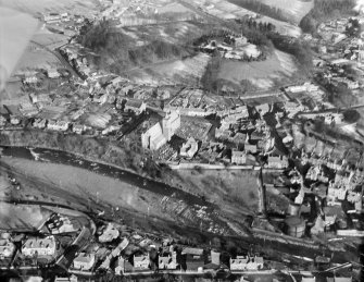 Dunblane, general view, showing Dunblane Cathedral and Holmehill House.  Oblique aerial photograph taken facing north-east.