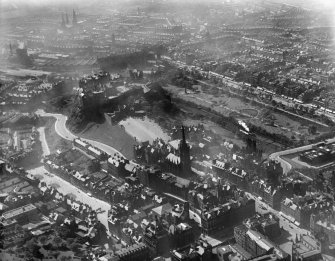 Edinburgh, general view, showing Edinburgh Castle and Princes Street Gardens.  Oblique aerial photograph taken facing north-west.