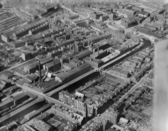 Edinburgh, general view, showing North British Rubber Co. Works and Fountain Brewery.  Oblique aerial photograph taken facing north.