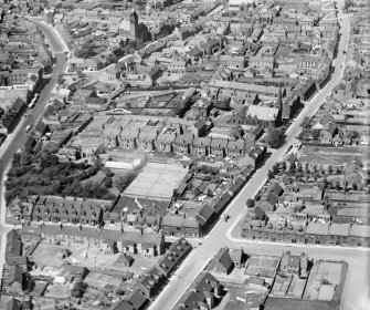 Bathgate, general view, showing St John's Church and Mid Street.  Oblique aerial photograph taken facing north-west.  