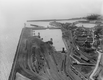 Burntisland, general view, showing railway sidings and East Dock.  Oblique aerial photograph taken facing west.