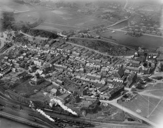 Burntisland, general view, showing High Street and Burntisland Parish Church.  Oblique aerial photograph taken facing north-west.