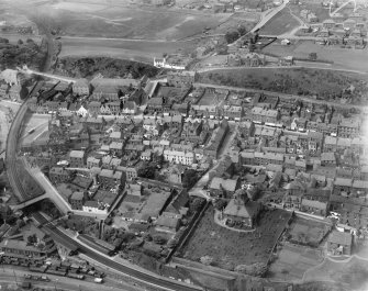 Burntisland, general view, showing High Street and Burntisland Parish Church.  Oblique aerial photograph taken facing north.