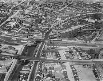 Coatbridge, general view, showing Coatbridge Cross, Caledonian Railway Bridge and Main Street.  Oblique aerial photograph taken facing north-east.