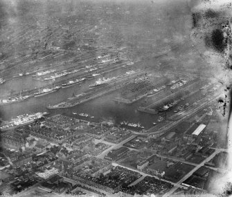 Prince's Dock and Queen's Dock, Glasgow.  Oblique aerial photograph taken facing east.  This image has been produced from a damaged negative.