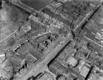 Edinburgh, general view, showing High Street, Cockburn Street and Tron Kirk.  Oblique aerial photograph taken facing north-east.  This image has been produced from a damaged negative.
