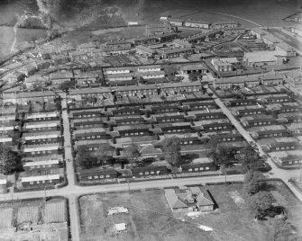 Gretna, general view, showing Annan Road and Union Road.  Oblique aerial photograph taken facing north.  This image has been produced from a damaged negative.
