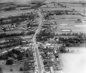 Auchterarder, general view, showing High Street and Barony Parish Church.  Oblique aerial photograph taken facing west.