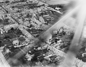Huntly, general view, showing Strathbogie Parish Church, Bogie Street and Castle Street.  Oblique aerial photograph taken facing north.