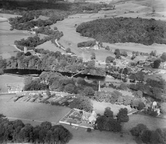 Newton Stewart, general view, showing Monigaff Parish Church and Penkiln Suspension Bridge.  Oblique aerial photograph taken facing east.