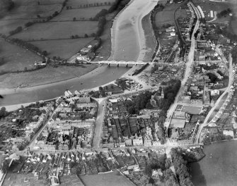 Kirkcudbright, general view, showing Kirkcudbright Bridge, St Mary Street and MacLellan's Castle.  Oblique aerial photograph taken facing north-east.